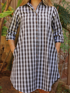 Moana Collection Dress in ʻAʻā features a classic Palaka pattern with button-down front. Sleeves rolled up, pockets visible.